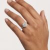 heart shaped diamond in the centre with brilliant cut diamonds claw set in the halo