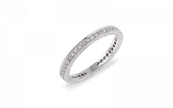 18ct White gold 44 round brilliant cut diamonds grain set completed around the band with mill grain edge and engraved pattern sides.