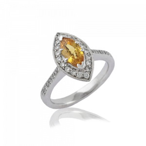 golden sapphireladies diamond ring with marquise stone and round diamonds