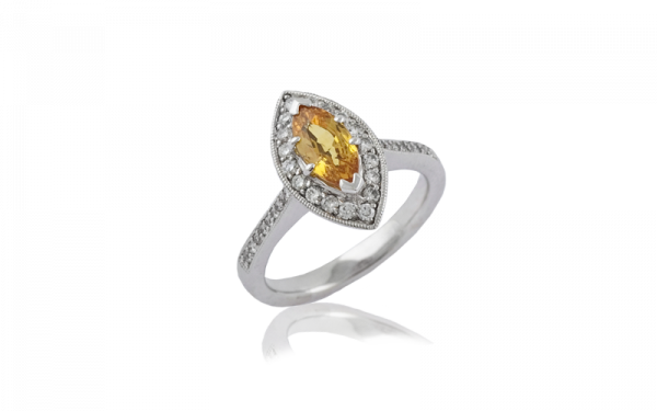 golden sapphireladies diamond ring with marquise stone and round diamonds