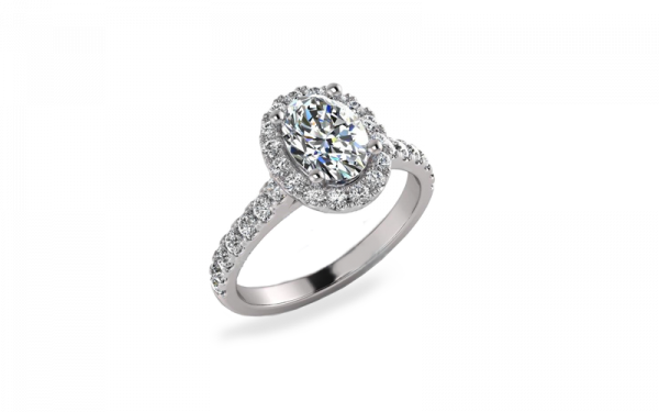 Oval Halo white gold design features an oval shaped diamond surrounded by brilliant cut diamonds including down the shoulders on a fine low band.