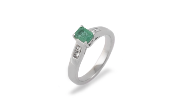 Emerald cut natural emerald with princess cut diamonds