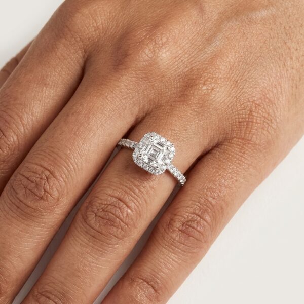 asscher cut diamond claw set in centre surrounded by brilliant cut diamonds
