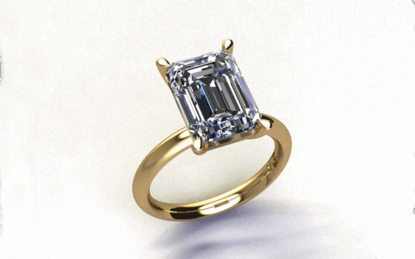 Amores design ring Solitaire emerald cut diamond